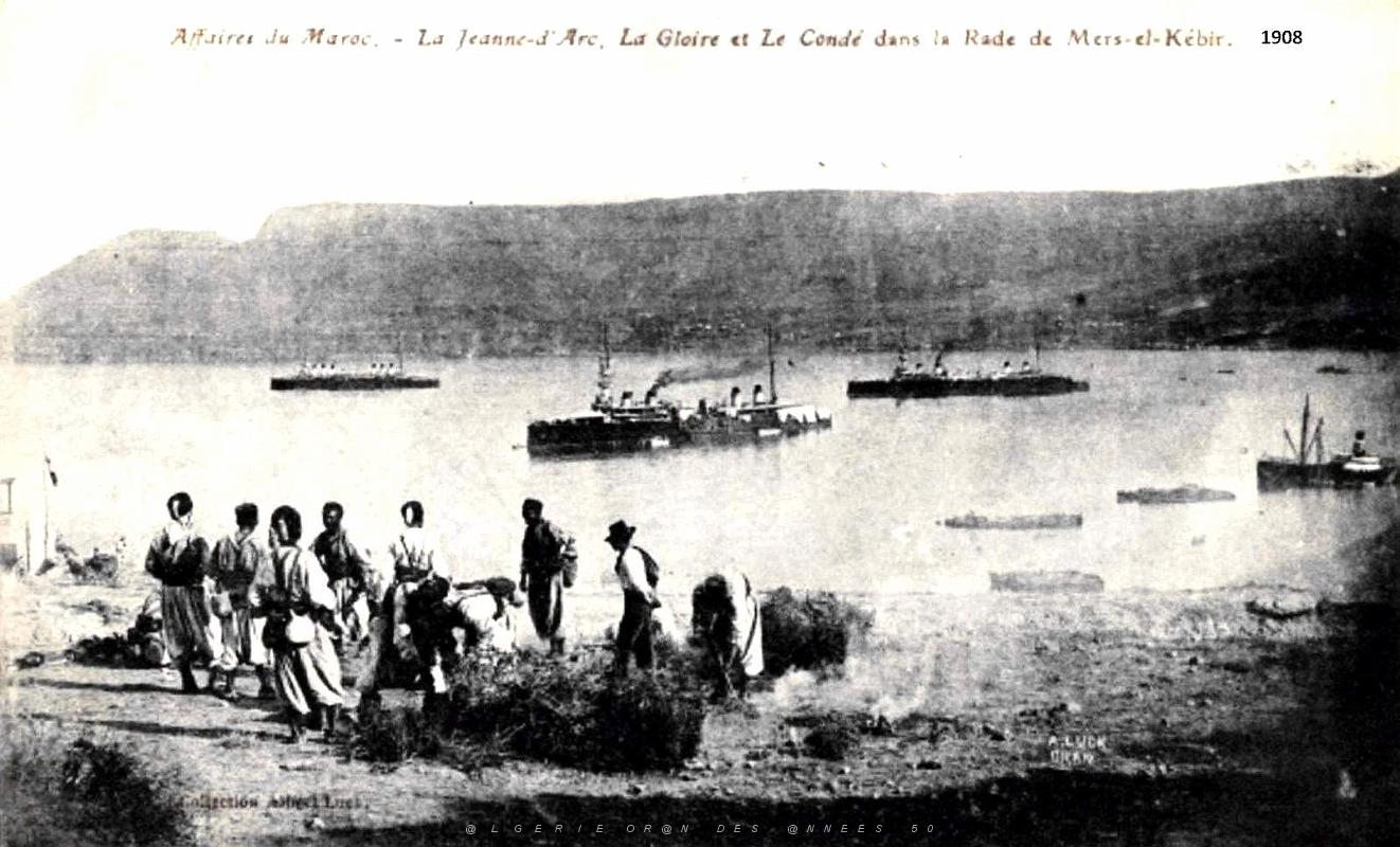 Mers-el-Kebir - La Rade - La Jeanne d'Arc, La Gloire et le Conde  avant embarquement pour le Maroc- 1908.jpg